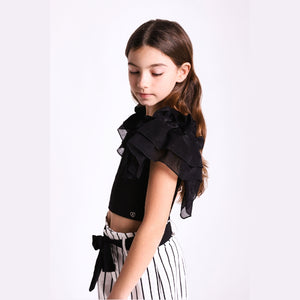 Top nero con volant